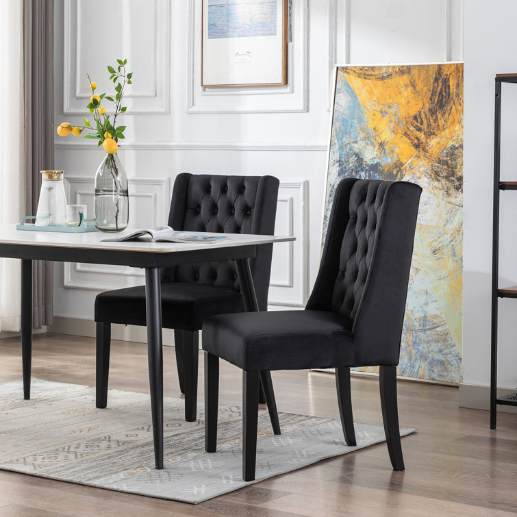 Black tufted dining online chair